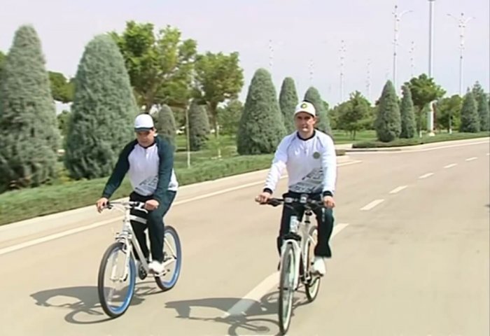 Turkmen President Cycles Along Caspian Sea Coast With His Son